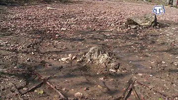 Разбитая дорога в в микрорайоне Солнечная долина.